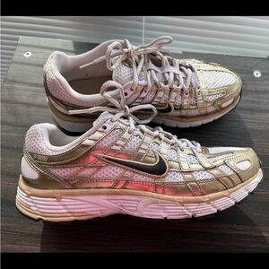 Nike Women's gold Metallic p-6000 Running Sneakers